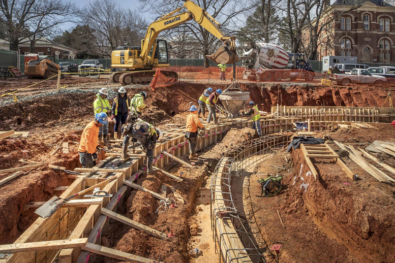 crane digging foundation of memorial